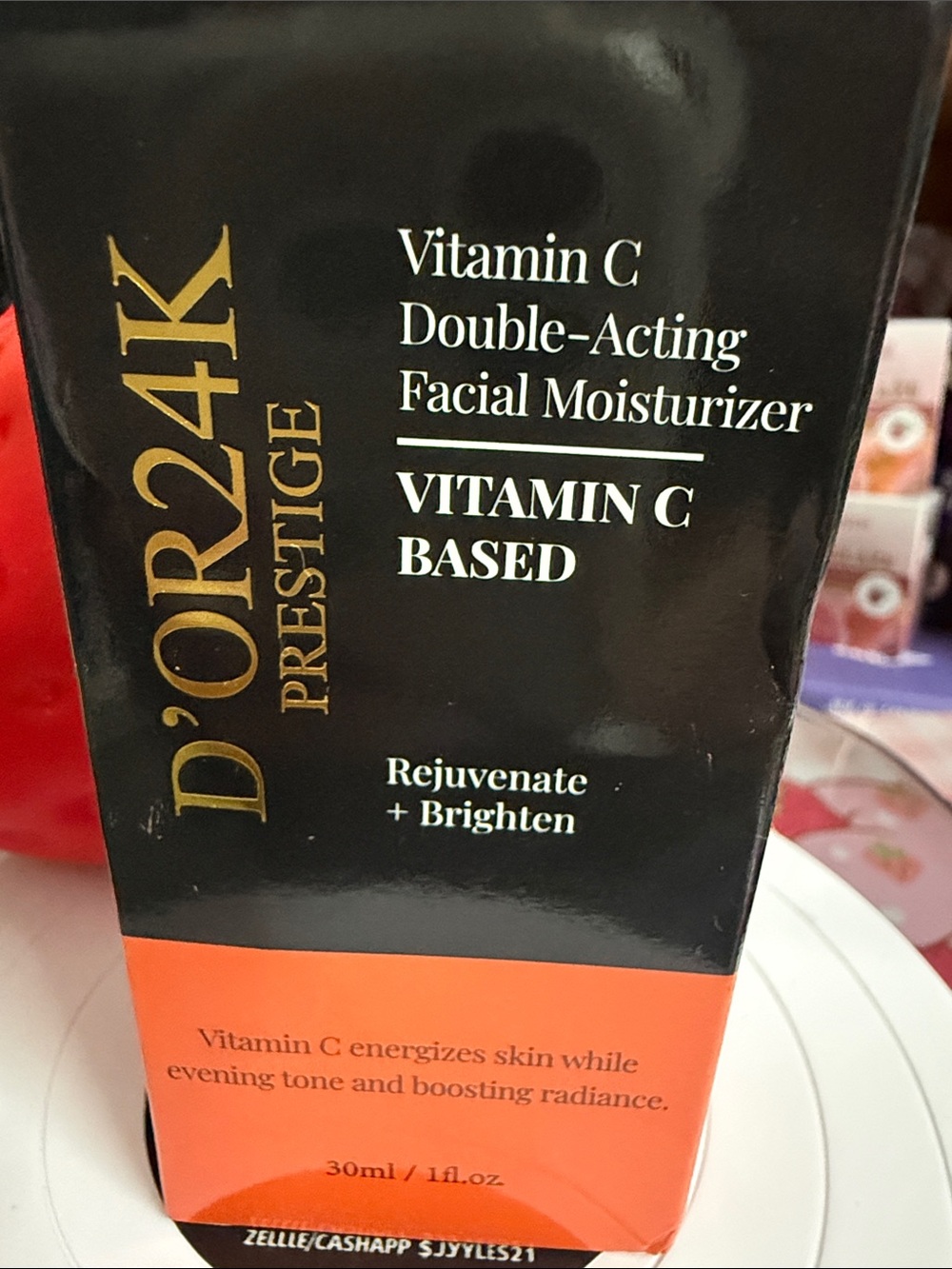 D'OR24K Prestige Vitamin C Double-Acting Facial Moisturizer — Black & Orange